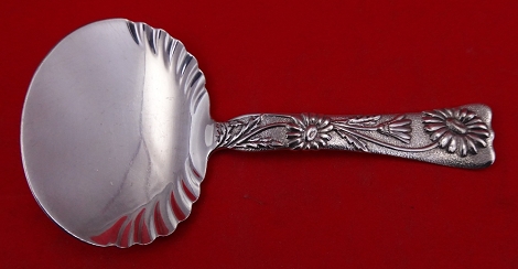 Bon Bon Spoon solid  w/ daisy motif  5 3/8